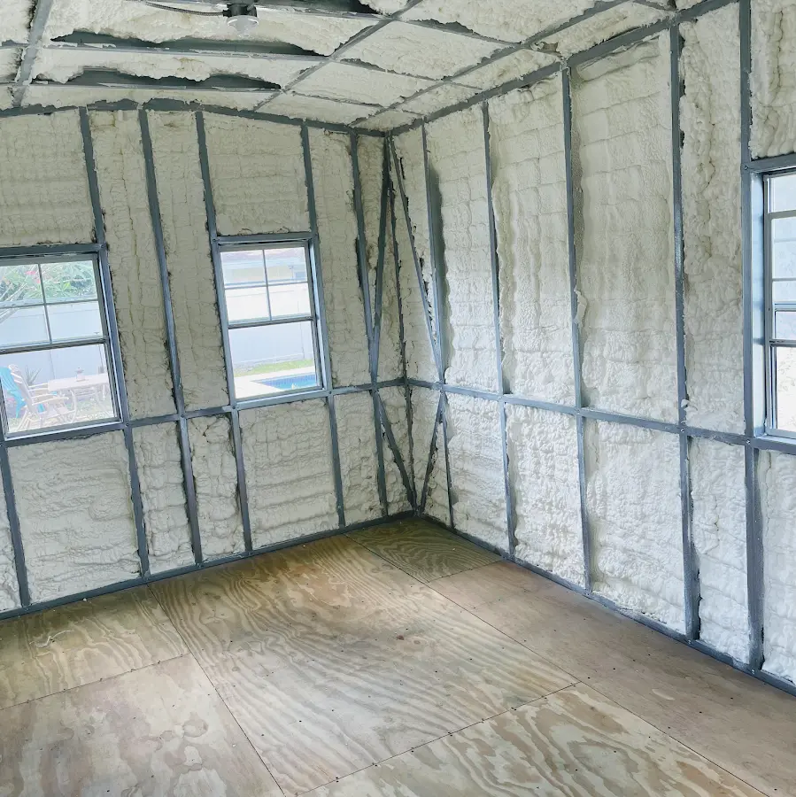 Closed-cell spray foam insulation applied to wall cavities in a residential project in Plaquemine