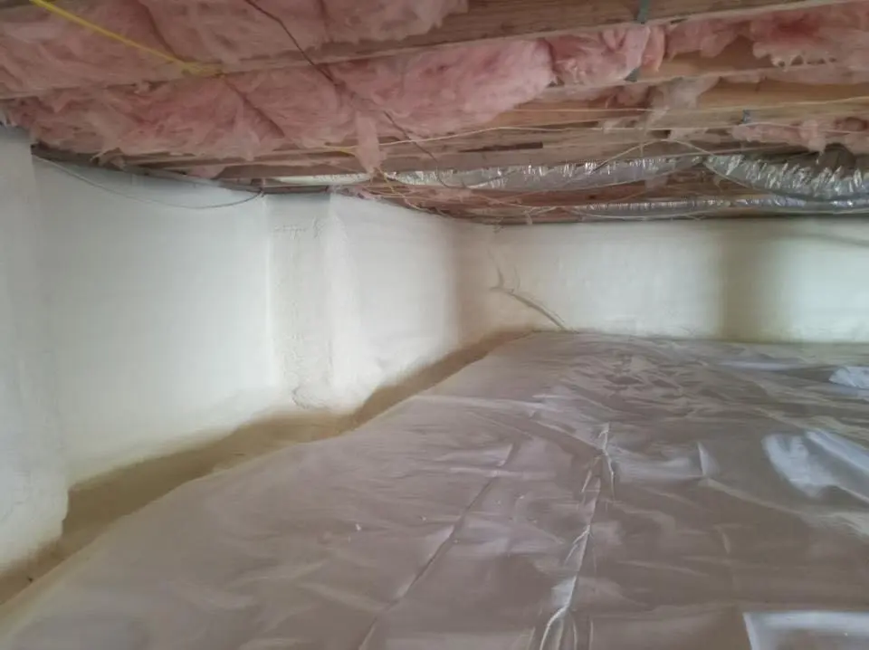 Crawl space encapsulation with closed-cell spray foam for Commercial Roof Restoration in Plaquemine